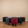 Round Upholstered Ottoman V1 BY J SERIES PACK OF 2